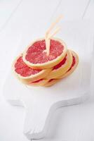 Slices of red grapefruit photo