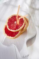 Slices of red grapefruit photo