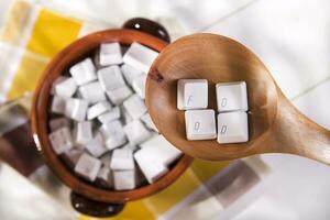 a wooden spoon with a keyboard on it photo