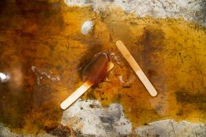 a brown liquid on a surface photo