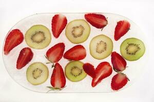 Kiwi and strawberries photo