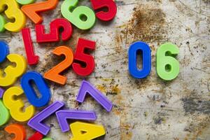 colorful plastic numbers on a white background photo