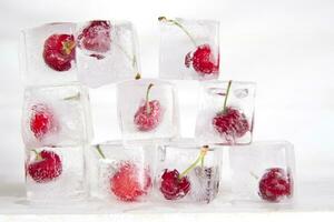 ice cubes with cherries on top photo