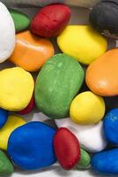 a box filled with colorful rocks photo