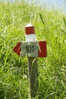 a sign on a rock photo