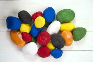 a box filled with colorful rocks photo