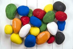 a box filled with colorful rocks photo