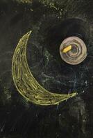 a chalk drawing of a cloud and snow on a blackboard photo