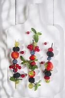 Skewer of berries photo