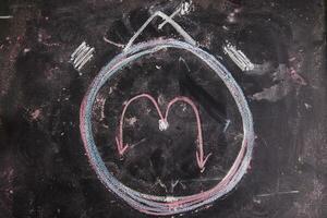 a chalk drawing of a clock photo