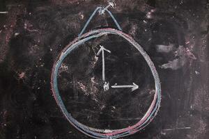 a chalk drawing of a clock photo