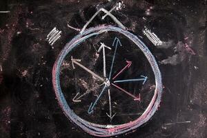 a chalk drawing of a clock photo