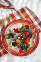 Skewer of berries in pot photo