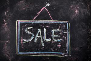 sale chalkboard on blackboard stock photo