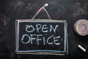 open office concept written on a chalkboard with chalk photo