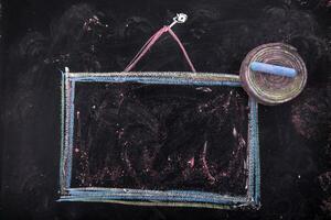 a chalk drawing of a square frame with a triangle on it photo
