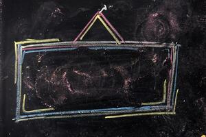a chalk drawing of a square frame with a triangle on it photo
