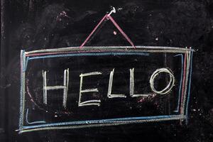 hello written on a blackboard photo