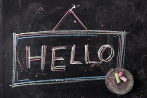 hello written on a blackboard photo