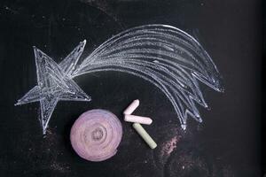 a chalk drawing of a star and a star shaped object photo