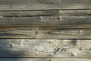 a close up of a wooden wall with a clock on it photo