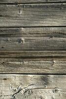 a close up of a wooden wall with a red fire hydrant photo