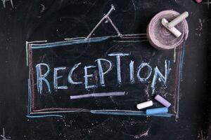 reception written on a chalkboard photo