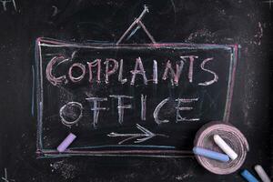 complaints office - chalkboard with chalk writing photo