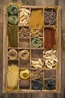 a box filled with different types of pasta photo