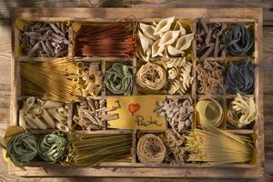 a box filled with different types of pasta photo