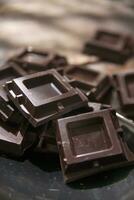 Cubes of dark chocolate photo