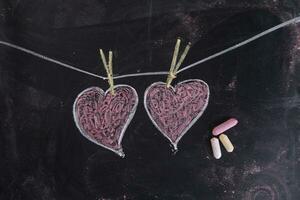 Hearts drawn with chalk photo