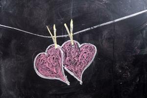 Hearts drawn with chalk photo