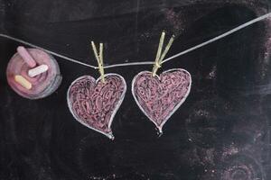 Hearts drawn with chalk photo