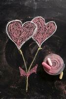 Hearts drawn with chalk photo