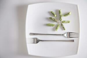 Raw asparagus tips photo