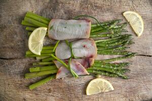 Asparagus with swordfish photo