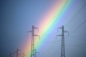 Rainbow through power line photo