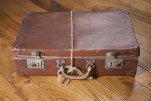 Old cardboard suitcase photo