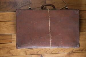 Old cardboard suitcase photo