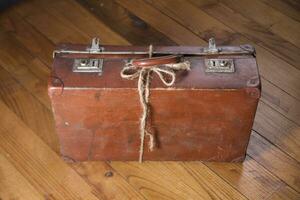 Old cardboard suitcase photo