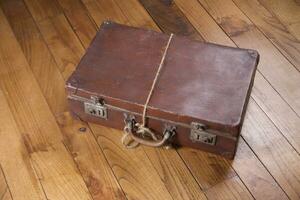 Old cardboard suitcase photo