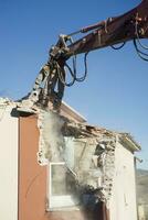 The controlled demolition of a house photo