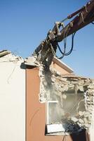 The controlled demolition of a house photo