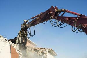 The controlled demolition of a house photo