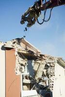 The controlled demolition of a house photo