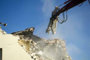 The controlled demolition of a house photo