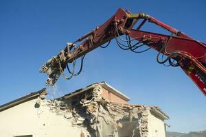 The controlled demolition of a house photo