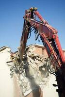 The controlled demolition of a house photo