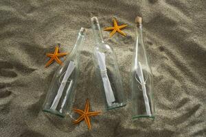 Message in a bottle at the beach photo
